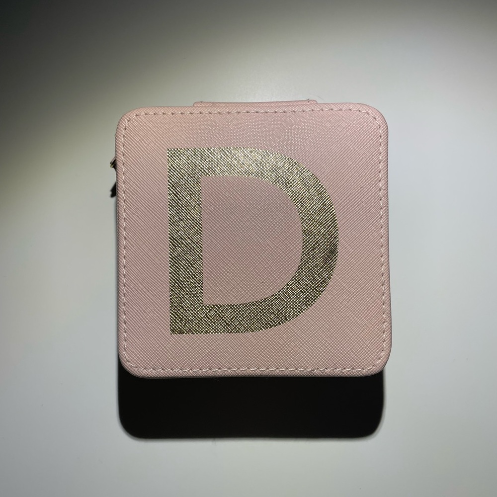 Monogrammed “D” travel size jewelry organizer